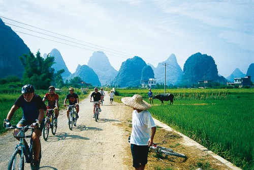 Cycling through rural villages Yangshao, China - <i>Photo: Scott Pinnegar</i>