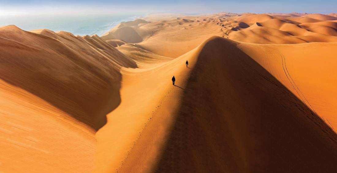 Climbing the sand dunes of Sossusvlei |  <i>Peter Walton</i>