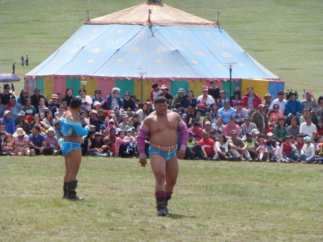Wrestlers at the Naadam Festival in Mongolia |  <i>Caroline Mongrain</i>