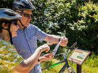 Planning the days' cycling on the Otago Central Rail Trail |  <i>Lachlan Gardiner</i>