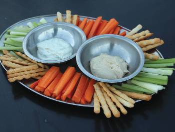 testPre-dinner snacks at Charlie's Camp on the Larapinta Trail. Dips with carrot, celery and bread-sticks. |  <i>Ayla Rowe</i>