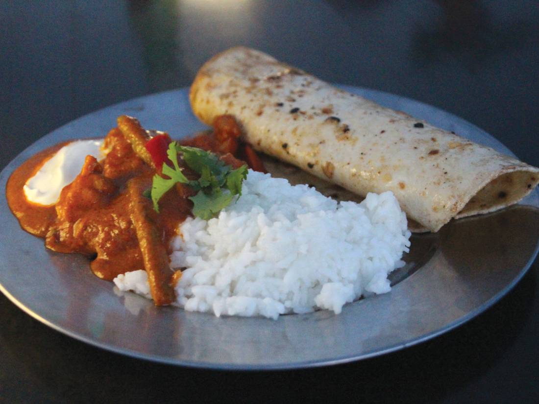 Butter chicken & rice with naan bread |  <i>Ayla Rowe</i>