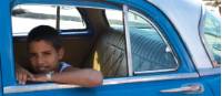 Young boy sitting in a car in Havana |  <i>Vanessa Dean</i>