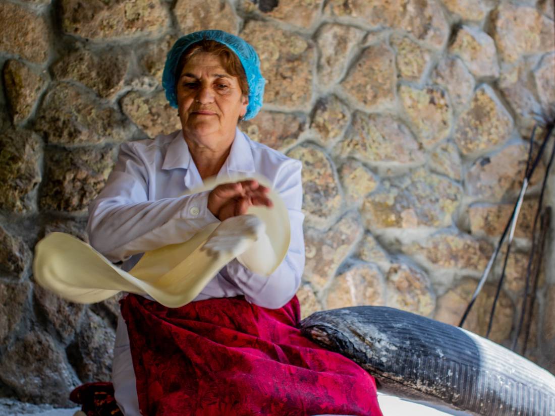 A local lady makes lavash, a flatbread eaten throughout the South Caucasus |  <i>Breanna Wilson</i>