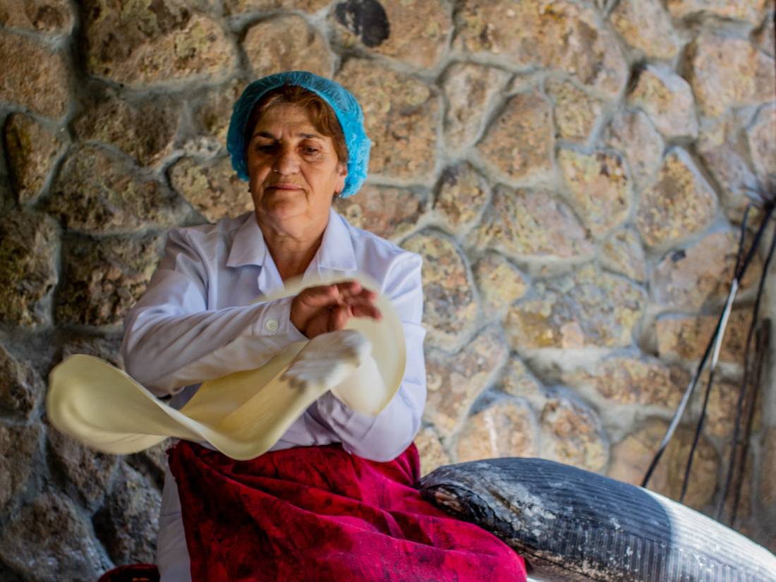A local lady makes lavash, a flatbread eaten throughout the South Caucasus |  <i>Breanna Wilson</i>