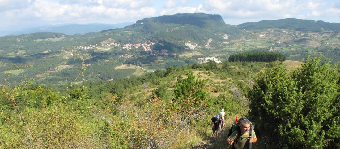 Walking on the open landscapes of western Tuscany on the St Francis Way