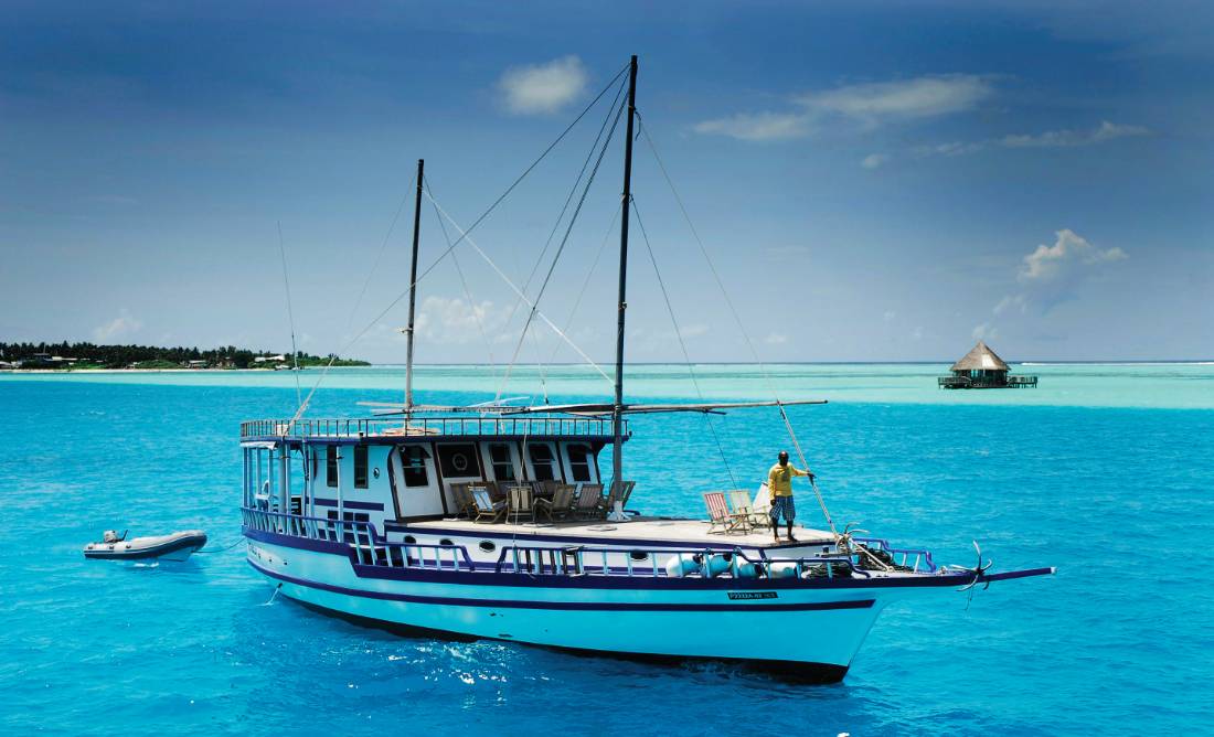 A traditional dhoni cruise is the best way to explore the turquoise waters of the Maldives