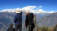 Trekkers admiring Dhaulagiri as seen from the view point above the Kali Gandaki Gorge |  <i>Brad Atwal</i>