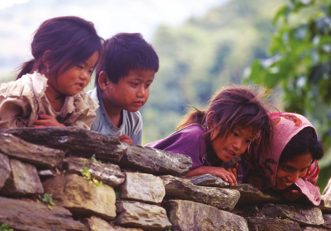 Whilst trekking through the small Hindu villages in the Annapurnas you will be met by the enthusiastic greetings of the Nepali children |  <i>David Tatnall</i>
