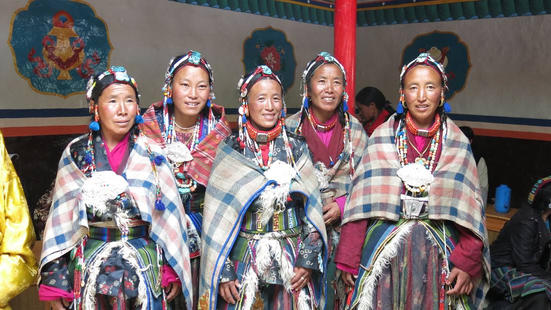 Village women in rarely seen traditional dress worn at festival times, Chosar village, Upper Mustang. |  <i>Margie Thomas</i>