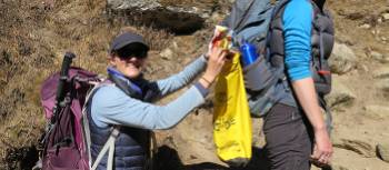 Picking up rubbish for the 10 Pieces Initiative on Everest Circuit & the Cho La | Ayla Rowe